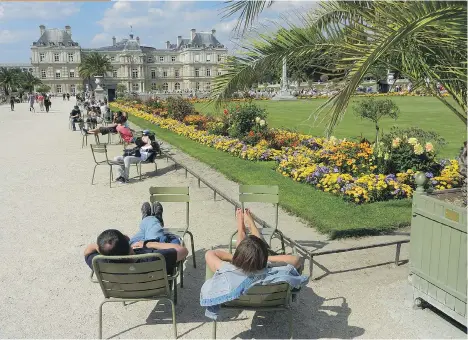  ?? RICK STEVES ?? Put your weary feet up in Luxembourg Garden, a picturesqu­e place to recharge in Paris.