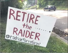  ?? PETE BANNAN - MEDIANEWS GROUP ?? This sign on Conestoga Road in Bryn Mawr calls for the retirement of the Raider at Radnor High School.