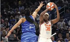  ?? ?? Connecticu­t’s Jonquel Jones shoots over Chicago’s Candace Parker during the first half of Thursday’s Game 5 of their WNBA semi-final series. Photograph: Charles Rex Arbogast/AP