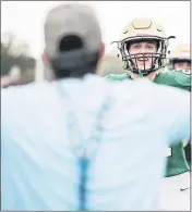  ?? MEDIANEWS GROUP PHOTO ?? Lansdale Catholic kicker Brendan Menges (21) is mobbed by classmates after hitting a game-winning 33-yard field goal against Bishop McDevitt last season.