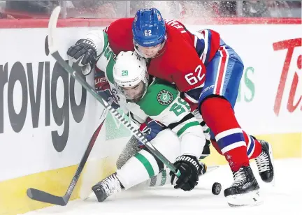  ?? JOHN MAHONEY ?? Canadiens forward Artturi Lehkonen checks Dallas Stars defenceman, and former Hab, Greg Pateryn during the first period Tuesday.