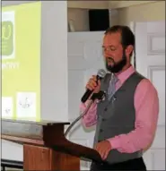  ?? MICHILEA PATTERSON — FOR DIGITAL FIRST MEDIA ?? Daniel Price, Mosaic Community Land Trust garden manager, announces the winners of the 6th Annual Home Garden Contest during the awards ceremony at Brookside Country Club on July 22.