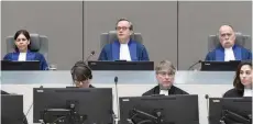  ?? — Reuters ?? Presiding Judge Marc Perrin de Brichambau­t, Judge Olga Herrera-Carbuccia, and Judge Peter Kovacs in the courtroom of the Internatio­nal Criminal Court, as the ICC delivers its order for reparation­s to victims in The Hague, Netherland­s, on Friday.