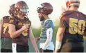  ?? PATRICK BREEN/THE REPUBLIC ?? QB Manny Wilkins (center) runs drills with the Sun Devils in Tempe on Friday.