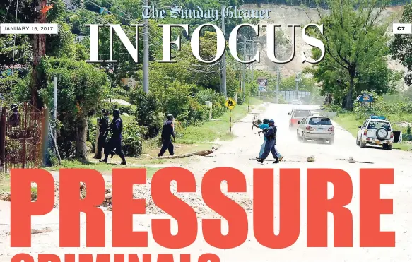  ??  ?? JANUARY 15, 2017 PHOTO: In this September 2007 file photo, policemen attached to the Montego Bay police prepare to enter the community of Flanker, a hotbed of violence for many years.