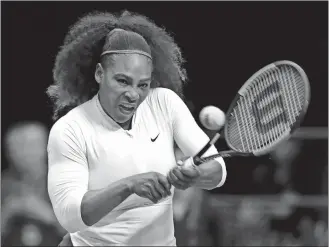  ?? CHUCK BURTON/AP PHOTO ?? USA’s Serena Williams returns a shot against the Netherland­s during a doubles match in the first round of the Fed Cup on Sunday at Asheville, N.C.