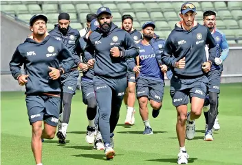  ?? — PTI ?? Indian players warm up during a training session ahead of their fifth Test against England at Edgbaston in Birmingham, England, on Wednesday.