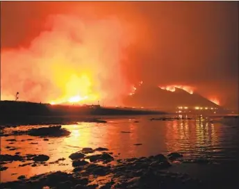  ?? Los Angeles Times ?? A WARMING Earth promises sea-level rise, major hurricanes and wildfires like the 2017 Thomas fire.