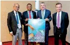  ??  ?? Maxwell de Silva (NOCSL Secretary General), Suresh Subramania­m (NOC, President), Dr. Thomas Bach (IOC President) and Pere Miro
(NOC Relations)