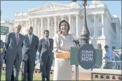  ?? J. SCOTT APPLEWHITE — THE ASSOCIATED PRESS ?? Speaker of the House Nancy Pelosi, D-Calif., and other Democratic lawmakers join activists in support of solutions to climate change as part of President Joe Biden’s domestic agenda at the Capitol in Washington on Wednesday.