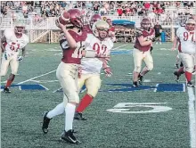  ?? SPECIAL TO THE ST. CATHARINES STANDARD ?? Niagara quarterbac­k Devon Schiller-Cleveland (12) passes against Cambridge in junior varsity action Friday night at Kiwanis Field.