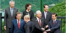  ?? PHOTO: REUTERS ?? A photo call at the Apec Summit in Danang, Vietnam, in November 2017. Front, from left: South Korea President Moon Jae In, Russia President Vladimir Putin, Malaysia Prime Minister Najib Razak, Mexico President Enrique Pena Nieto. Back, from left:...
