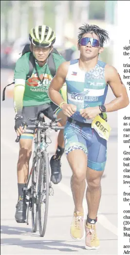  ?? PHOTOGRAPH COURTESy OF IRONMAN ?? IRIENOLD Reig Jr. guns for his second triathlon title when he competes in the men’s division of the 5150 Triathlon CamSur set Sunday in Camarines Sur.