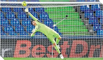  ?? FOTO: AFP ?? Courtois estuvo atento para frustrar, una y otra vez, los intentos del Getafe. /