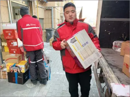  ?? PHOTOS PROVIDED TO CHINA DAILY ?? Li Wei, 31, who works at a JD Logistics delivery station in Dalian, Liaoning province, has been separated from his daughter for more than a month.