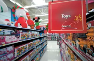  ??  ?? Toys sit on the shelves at a Walmart Supercente­r in Houston. — IC