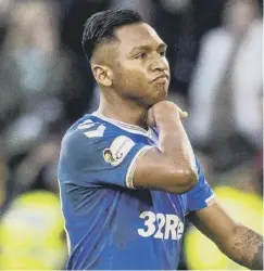  ??  ?? 0 Alfredo Morelos gestures to supporters after his red card.