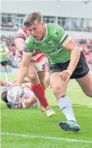  ?? Ste Jones - RLPIX.COM ?? Keanan Brand of Widnes Vikings crosses for a try