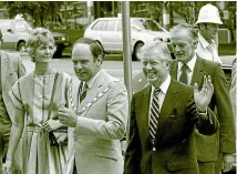  ??  ?? Jimmy Carter, front right, is greeted by Palmerston North mayor Brian Elwood.