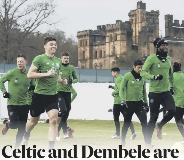  ??  ?? 0 Celtic’s No 10 Moussa Dembele was all smiles in training at Lennoxtown yesterday but he might not be involved against Partick Thistle tonight, with Leigh Griffiths, right, set to return from an ankle knock.