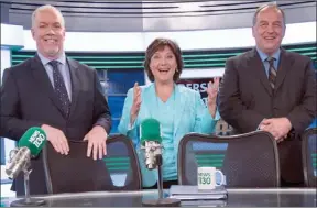  ?? The Canadian Press ?? B.C. NDP leader John Horgan, left, Liberal Leader Christy Clark and B.C. Green Party leader Andrew Weaver pose for a photo following the leaders’ debate in Vancouver on Thursday.