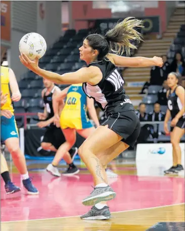  ??  ?? Te Puke High School teacher Tayla Blanchard in action for the New Zealand mixed open netball team at the recent trans tasman series.