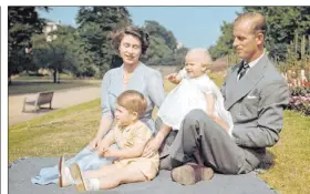  ?? Eddie Worth The Associated Press file ?? Britain’s Princess Elizabeth, later Queen Elizabeth II, Prince Philip and their children Prince Charles and Princess Anne in August 1951 at Clarence House in London.