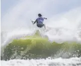  ?? Picture: NIGEL HALLETT ?? Australia’s Mikey Wright gets some air time at Snapper Rocks yesterday.