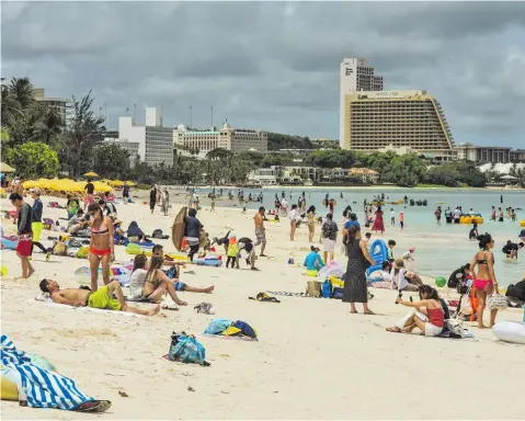  ?? Photo: Pacific Daily News ?? Guam Visitors Bureau reviews Tourism 2020 plan, begins work on 2025 plan. Pictured are visiting tourists and other beachgoers at Tumon Bay.