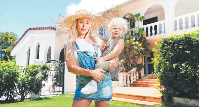  ??  ?? Skye Wheatley and her son, Forest, 2, at the Spanish mansion being transforme­d into a grand family home. Picture: Scott Powick