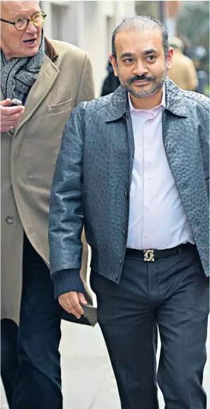  ??  ?? Nirav Modi, right, outside court yesterday with Daily Telegraph reporter Mick Brown; The Telegraph’s report from March 9, inset below