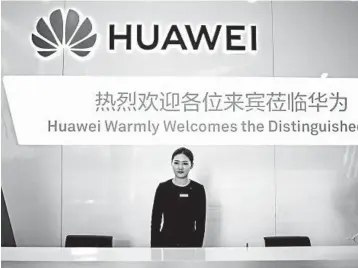  ?? FRED DUFOUR/GETTY-AFP ?? Huawei is being kept out of 5G networks by the United States, Australia and New Zealand.