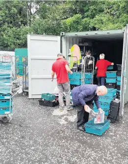  ??  ?? Feeding families Coatbridge community foodbank has seen an increase in demand since the beginning of lockdown