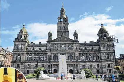  ?? PHOTOS: SANDIP HOR/GETTY IMAGES ?? Fine example . . . One of Glasgow’s grand neoclassic­al buildings, the City Chambers