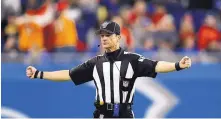  ?? PAUL SANCYA/ASSOCIATED PRESS FILE ?? Albuquerqu­e’s Land Clark, recently promoted to NFL referee, is one of a handful of pro sports arbiters who donated their time to give webinar talks to New Mexico high school officials.