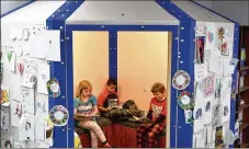  ?? NICK OXFORD/ NEW YORK TIMES ?? Students at Healdton Elementary School in Healdton, Okla., read last month inside a ballistic shelter designed to protect them from school shooters and tornadoes.