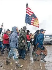  ?? BLAKE NICHOLSON/AP ?? The Standing Rock Sioux tribe’s fight against the Dakota Access pipeline keeps land rights on the minds of many.