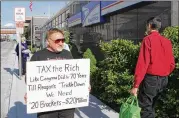  ?? DERIK HOLTMANN / BELLEVILLE NEWS-DEMOCRAT 2012 ?? James Hodgkinson of Belleville, Ill., above protesting current tax laws outside a post office in Belleville, was shot dead by police on Wednesday in Alexandria, Virginia.