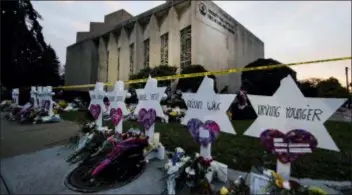  ?? MATT ROURKE - THE ASSOCIATED PRESS ?? In this Oct. 29 file photo, a makeshift memorial stands outside the Tree of Life synagogue in the aftermath of a deadly shooting in Pittsburgh.