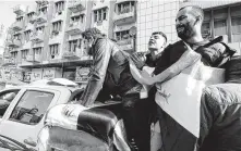  ??  ?? Iraqi mourners accompany the coffin of a demonstrat­or killed a day earlier during protests in Tahrir Square in Baghdad.