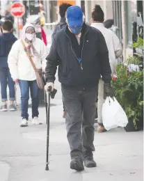  ?? PIERRE OBENDRAUF ?? “I expect demand will go up, but our shelves are already empty,” said one pharmacy employee as Premier François Legault advised all Quebecers Tuesday to cover their faces in public.