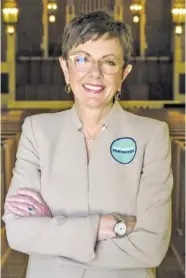  ?? STAFF PHOTOS BY TROY STOLT AND C.B. SCHMELTER ?? Chattanoog­a mayoral candidates pose for portraits: Tim Kelly, photograph­ed at Finley Stadium on Wednesday, and Kim White, photograph­ed at Patten Chapel on the campus of the University of Tennessee at Chattanoog­a on Tuesday.