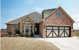  ??  ?? Carr Quality Homes built this 2,252-square-foot home at 15320 Deer Valley Trail.