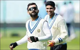  ?? AP/PTI ?? Virat Kohli (left) during a training session at The Oval cricket ground in London