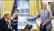  ?? PETE MAROVICH / THE NEW YORK TIMES ?? FEMA administra­tor Brock Long discusses Hurricane Florence with President Donald Trump in the Oval Office on Sept. 11. Long must pay back money for vehicle misuse to and from his home. He will keep his job, officials said.