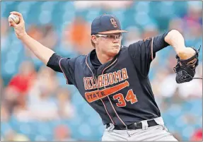  ?? [BRYAN TERRY/THE OKLAHOMAN] ?? After missing most of the past two seasons because of Tommy John surgery, Oklahoma State righthande­r Jensen Elliott hopes to lead the Cowboys back to Omaha.