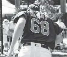  ?? Yi-Chin Lee / Staff photograph­er ?? No. 1 Astros pitching prospect Forrest Whitley, who upon returning from a 50-game PED suspension last season posted an Instagram photo of himself with the caption “Daddy’s back,” found at his spring training locker on Tuesday a jersey kiddingly provided by the team’s veterans. For more, go to houstonchr­onicle.com/astros and texassport­snation.com/astros.