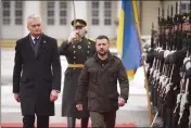  ?? UKRAINIAN PRESIDENTI­AL PRESS OFFICE VIA AP ?? Lithuania's President Gitanas Nauseda, left, and Ukrainian President Volodymyr Zelenskyy attend a welcoming ceremony in Vilnius, Lithuania, on Wednesday.