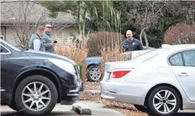  ?? NATHAN PAPES/SPRINGFIEL­D NEWS-LEADER ?? A Springfiel­d Police investigat­ors at the scene of an overnight shooting that left two men dead on East Erie Street on Thursday.