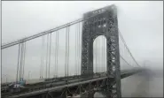  ?? RICHARD DREW - ASSOCIATED PRESS ?? In this 2014 file photo, traffic crosses the George Washington Bridge, in Fort Lee, N.J. Bill Baroni and Bridget Kelly, onetime allies of former New Jersey Gov. Chris Christie are making their case to the U.S. Supreme Court in a brief being filed Tuesday for why their conviction­s in the so-called “Bridgegate” case should be thrown out.